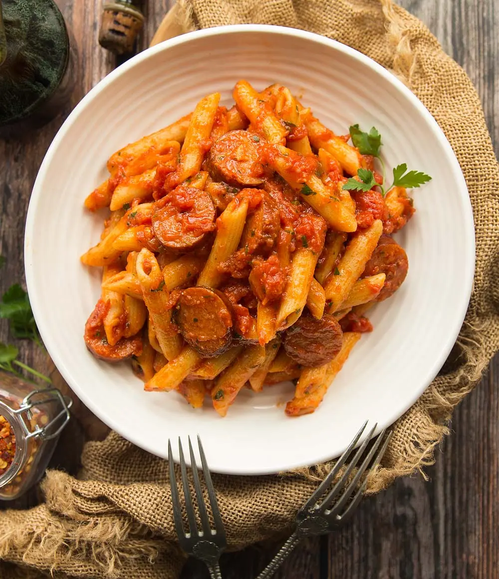 smoked sausage pasta tomato sauce - Can I put raw sausage in sauce