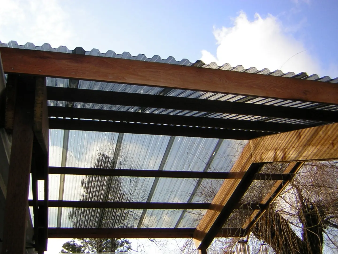 smoked plastic roofing - How long does polycarbonate roofing last