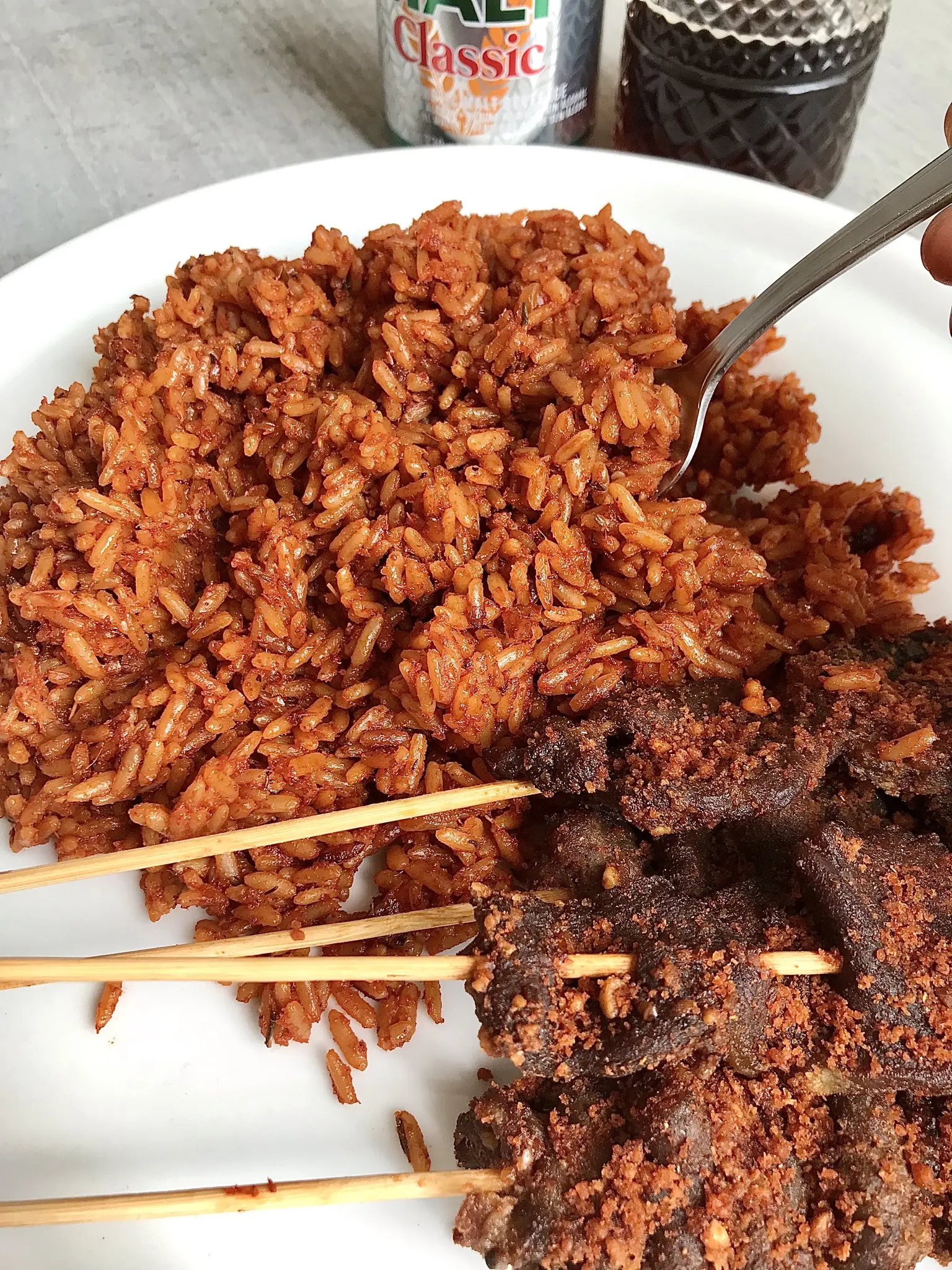 how to cook smoked jollof rice - What are the steps in cooking jollof rice without burning it