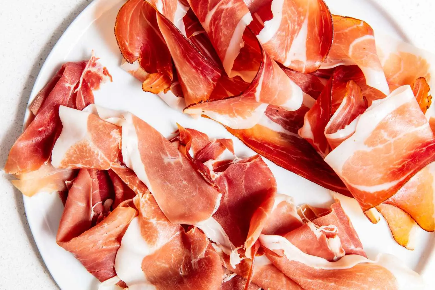 spanish smoked meat - What is prosciutto called in Spain